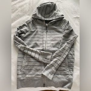 Lululemon full zip sweater, oversized. Has zipper detail in the back. EUC
